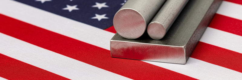 Steel bar stock resting on an American flag