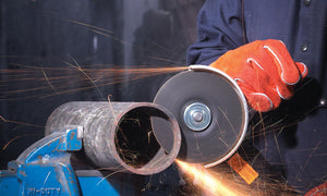 Walter COMBO ZIP wheel on an angle grinder cutting steel pipe